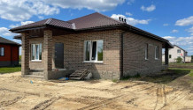 Фото новый кирпичный 4х-комнатный коттедж  100 м2 рядом с озером  в  черте г. строитель